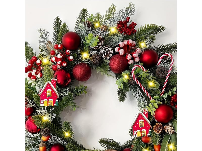  Couronne de noël lumineuse 50 cm, guirlande verte avec cannes en sucre, pommes de pin, baies et nœuds  - Conforama C