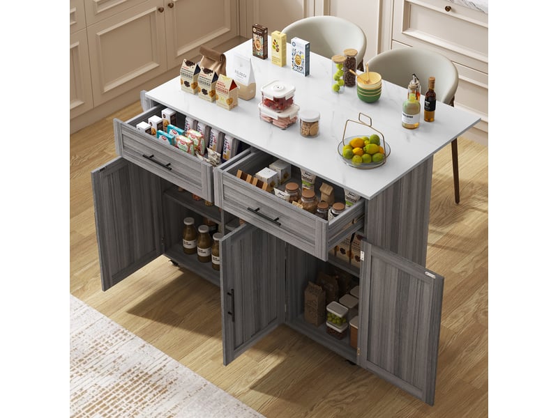  129 x 46 (71) x 91,5 cm. Buffettable de salle à manger avec plateau rabattable, étagères intégrées aux portes, îlot de cuisine sur 5 roulettes avec placards et 2 tiroirs, blanc et gris kaki.  - Conforama B