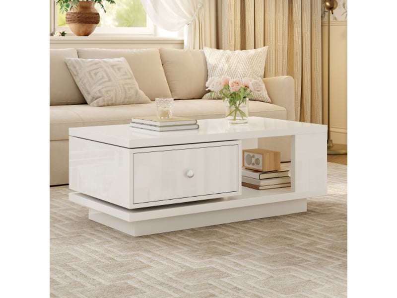  Table basse de salon à finition blanche brillante, avec tiroir pivotant, étagères ouvertes et poignées métalliques, 90 x 48 x 35 cm  - Conforama E