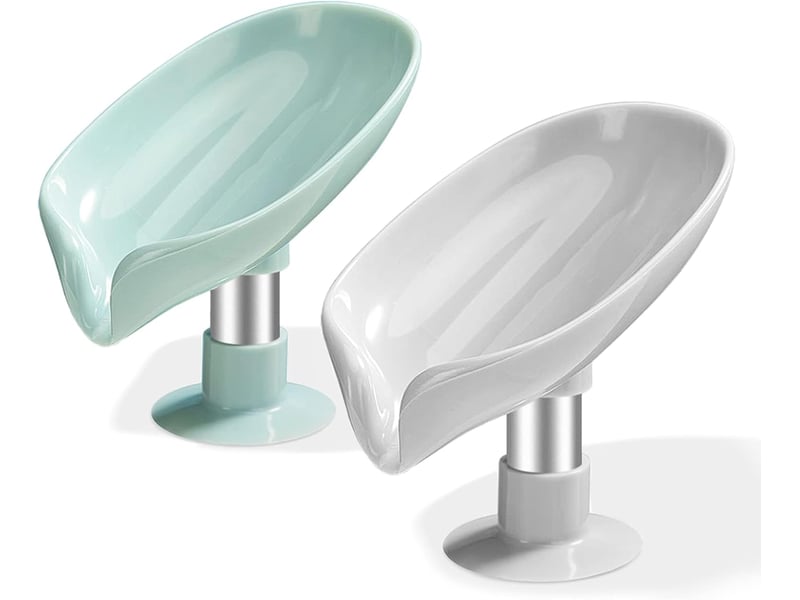  Ce porte-savon à ventouse peut être utilisé comme porte-savon de douche et possède un trou d'évacuation au fond pour un nettoyage facile.  - Conforama A