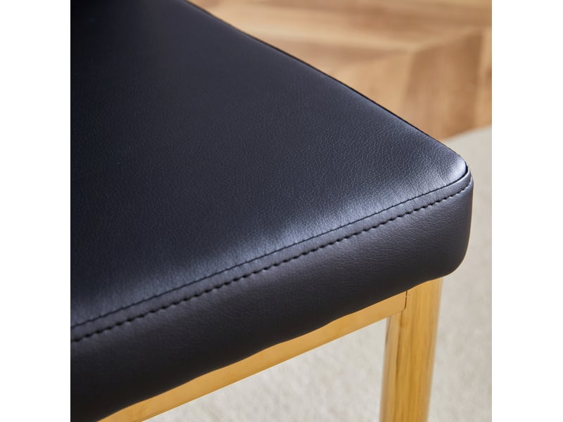  Set de 4 chaises 43x42,5x92,5 cm de salle à manger en cuir pu noir avec pieds métalliques dorés, dossier adapté  - Conforama D