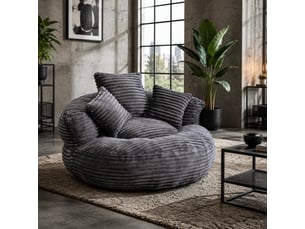Fauteuil pouf 1 place en velours côtelé gris foncé avec 3 coussins, dossier haut et accoudoirs enveloppants