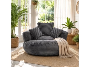 Fauteuil pouf avec dossier haut, accoudoirs et design ergonomique pour salon et chambre, en velours côtelé gris foncé