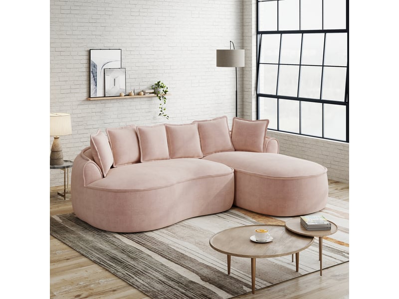 Canapé d'angle modulaire avec méridienne profonde, design ergonomique et coussins, en chenille rose - Conforama D