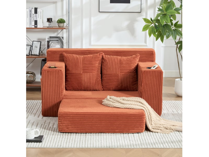  Canapé convertible 2 places avec coussins, porte-gobelet et poches latérales en velours côtelé orange  - Conforama D