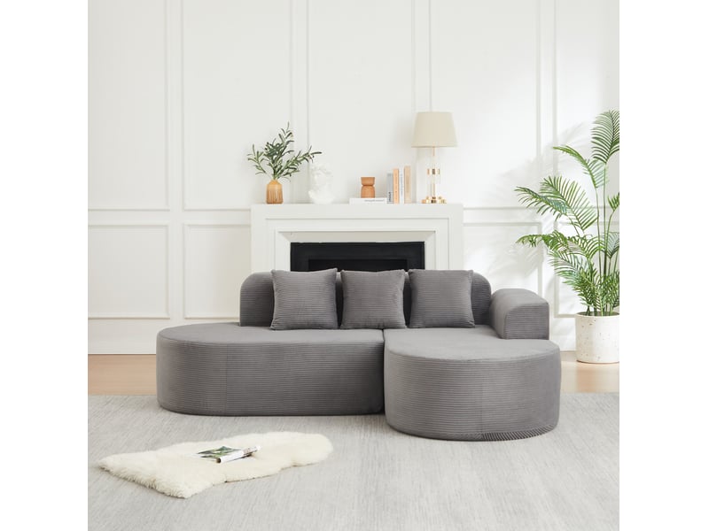 Canapé d'angle à méridienne incurvée avec accoudoirs arrondis et 3 coussins en velours côtelé gris, 220 × 155 × 70 cm - Conforama C