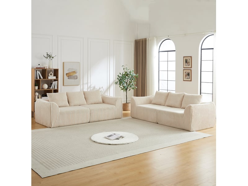  Canapé modulaire 6 places en velours côtelé beige, lignes arrondies et six coussins pour un salon chic  - Conforama E