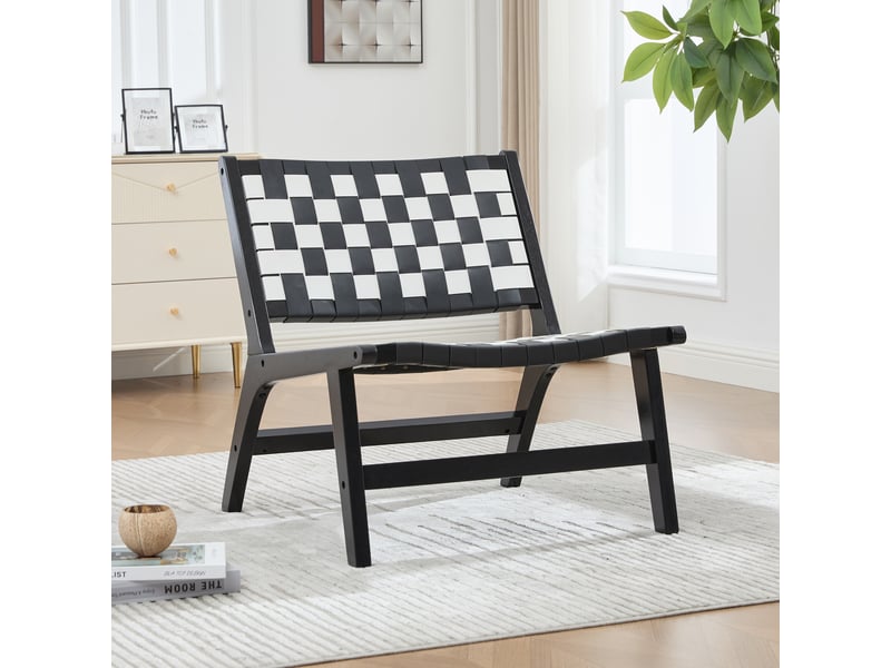  Fauteuil sans accoudoirs à tressage damier, assise basse avec coussin, structure en bois et pu noir, 71 × 66 × 72 cm  - Conforama C