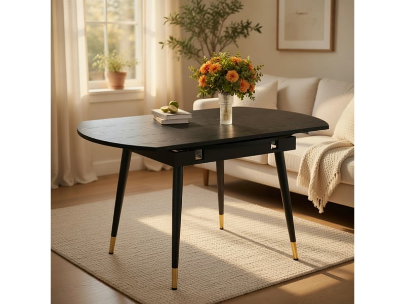  Table à manger extensible moderne se transformant de ronde à ovale en mdf noir ou noyer avec accents dorés sur pieds métalliques gain de place  - Conforama B