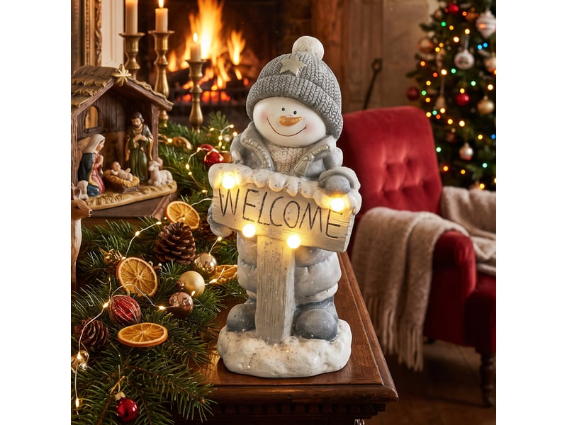  Décoration de noël : bonhomme de neige illuminé, statue de noël en mgo avec panneau de bienvenue, led et minuterie.  - Conforama D