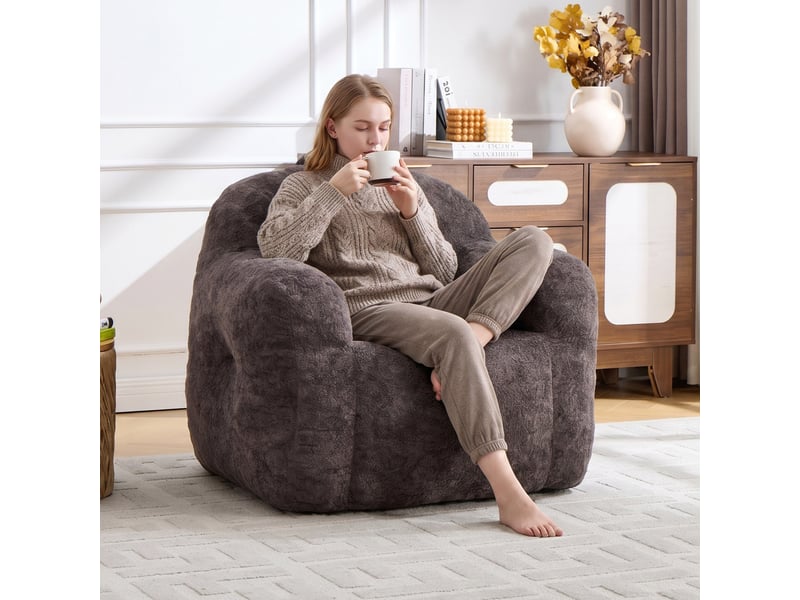 Pouf fauteuil gris foncé en fausse fourrure avec accoudoirs, rembourré mousse - Conforama B