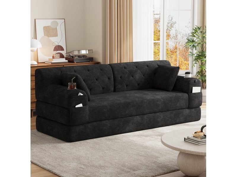  Canapé convertible compressé 3 places en velours côtelé noir, 4 poches et 2 porte-gobelets  - Conforama D