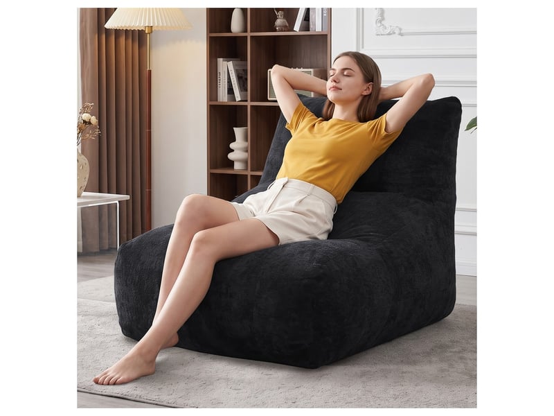  Pouf repose-pieds, coloris noir, dimensions : 94 x 131 x 80 cm  - Conforama B