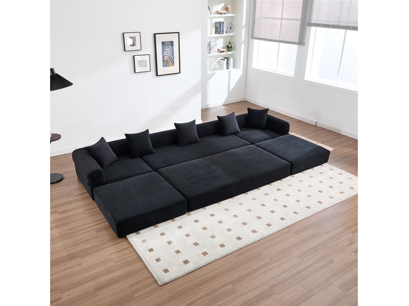 Canapé modulaire 4 places avec chaise longue, poches latérales et modules combinables en velours côtelé noir  - Conforama D