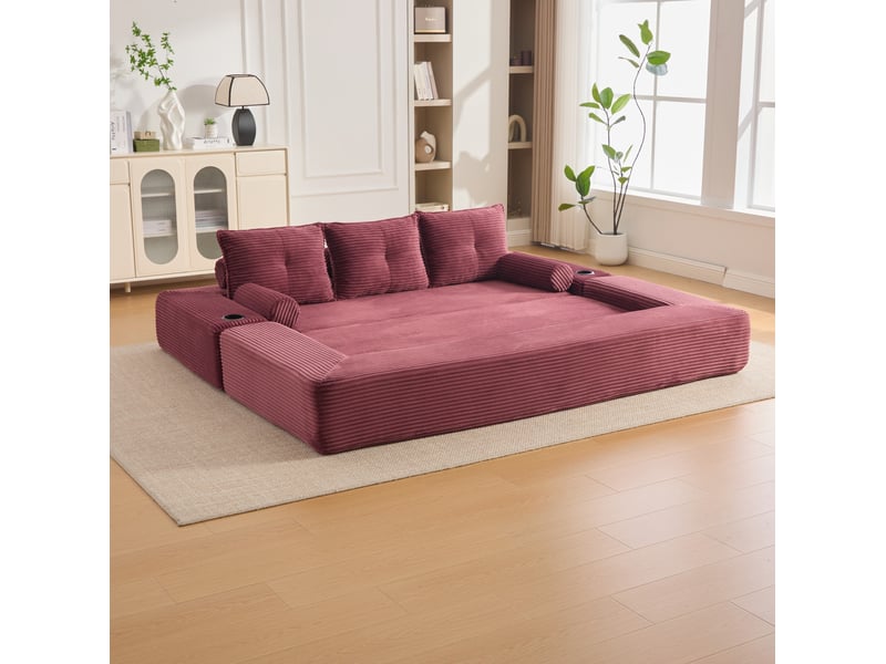  Canapé convertible 3 places avec poches, porte-gobelets et coussins à mémoire de forme, en velours côtelé rouge  - Conforama D