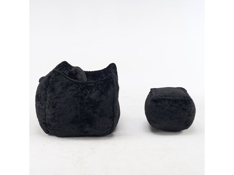 Pouf géant noir en fausse fourrure avec coussin et repose-pieds - Conforama E