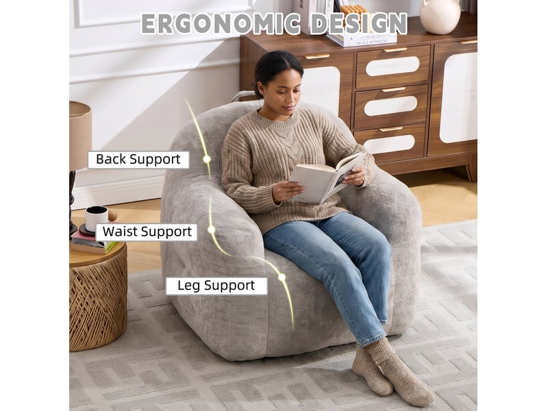  Fauteuil pouf avec accoudoirs et dossier enveloppant, garnissage en mousse déchiquetée, fausse fourrure gris clair  - Conforama D
