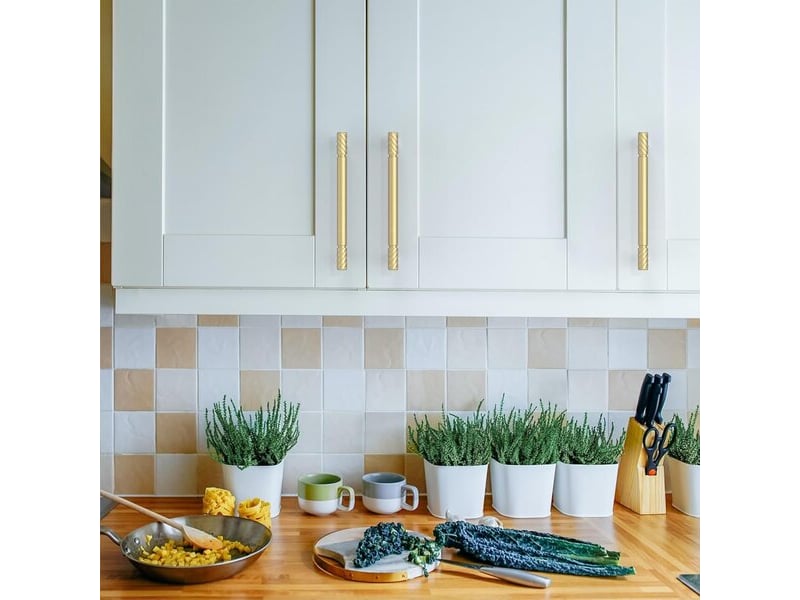 Jeu de 10 poignées pour meubles, couleur dorée, avec un entraxe de 160 mm - Conforama E