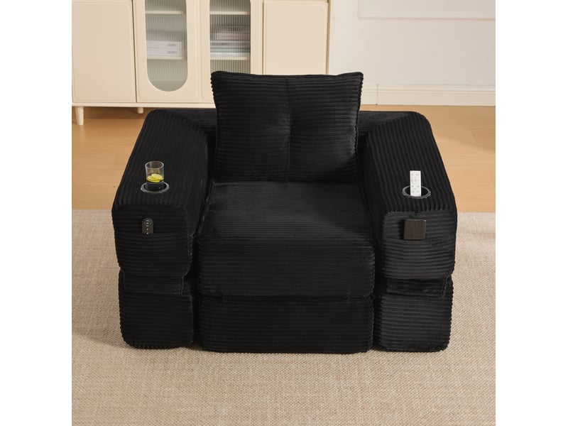  Canapé convertible 1 place avec mousse dense, ressorts, poche latérale et porte-gobelet en velours côtelé noir  - Conforama D