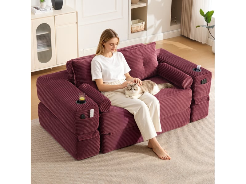 Canapé convertible modulable 2 places en velours côtelé rouge bordeaux, poches et porte-gobelets - Conforama D