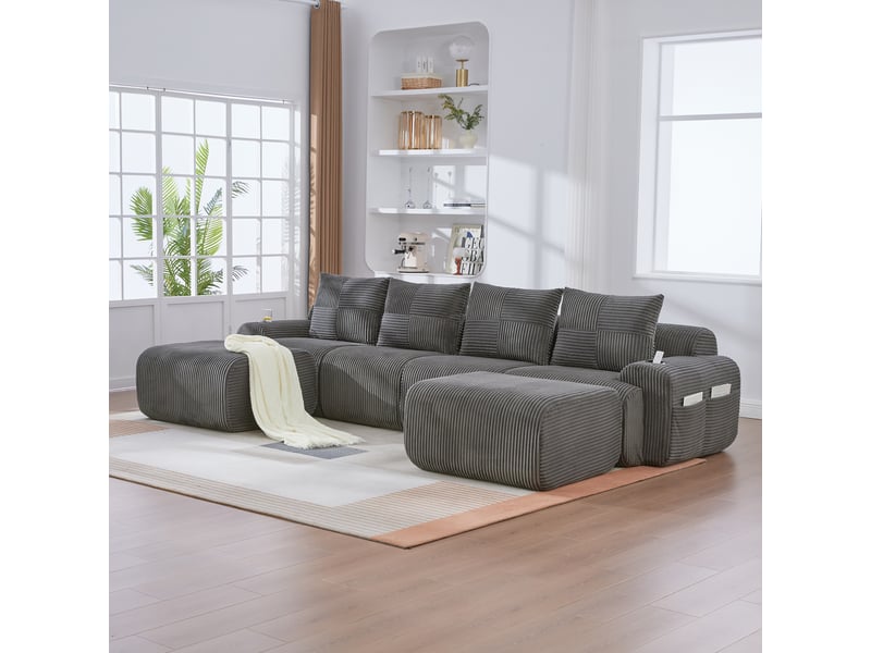 Canapé modulable 4 places en velours côtelé gris foncé, avec deux poufs, porte-gobelet et rangement, pour salon moderne - Conforama B