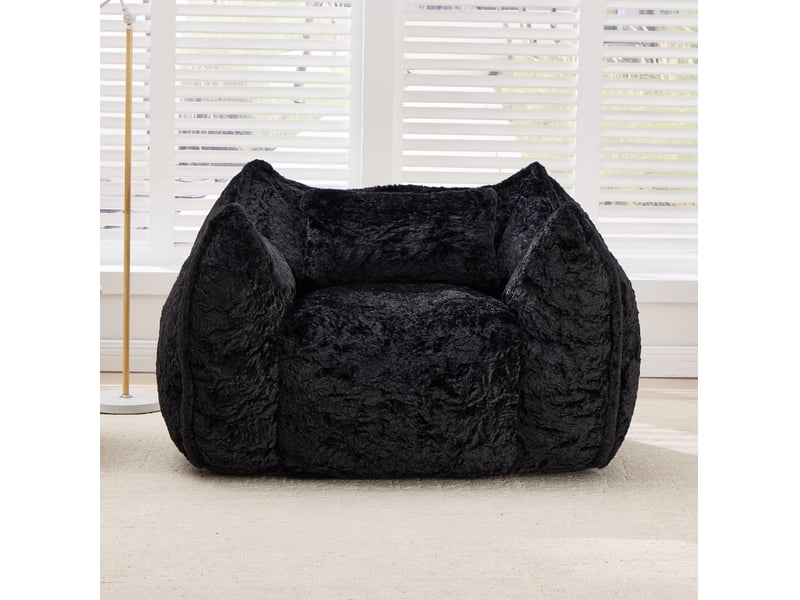  Fauteuil pouf géant avec coussin et dossier enveloppant en fausse fourrure noire, 123 × 97 × 73 cm  - Conforama B