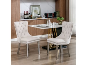 Lot de 2 chaises de salle à manger en velours beige, dossier haut capitonné, clous décoratifs, pieds finition chrome, structure en bois massif
