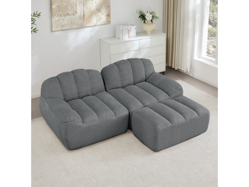  Canapé d'angle modulaire 2 places avec ottoman, assise ergonomique et dossier rembourré en fleece gris  - Conforama C