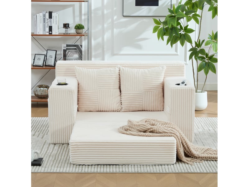 Canapé convertible 2 places avec deux coussins, porte-gobelet et poches latérales en velours côtelé beige - Conforama D