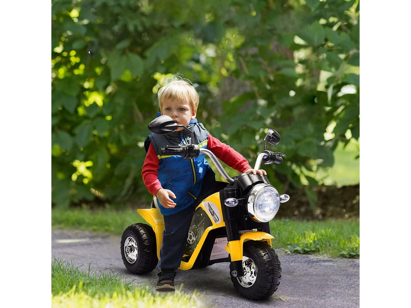  Tricycle électrique pour enfants (18-36 mois), batterie 6v, avec phare et klaxon, 72 x 57 x 56 cm, jaune  - Conforama D