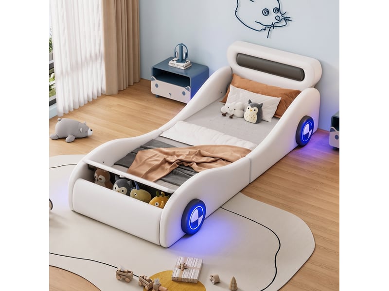  Lit enfant 90 × 200 cm en forme de voiture avec coffre au pied et quatre roues lumineuses, revêtement blanc en polyuréthane  - Conforama B