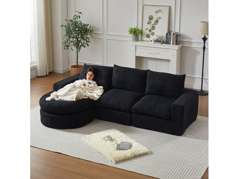  Canapé d'angle réversible 3 places modulable avec méridienne et coussins de nuque en chenille noir  - Conforama D