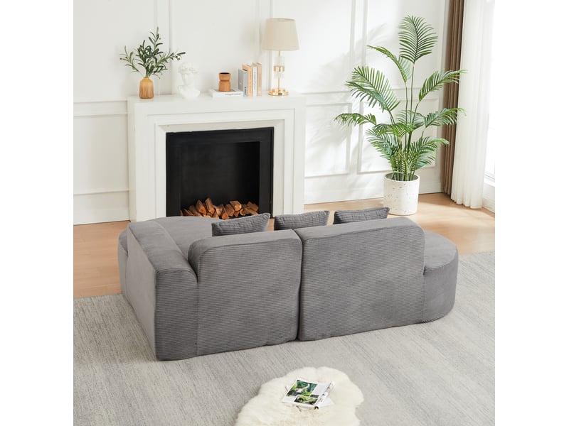 Canapé d'angle modulaire 4 places à méridienne, dossier incurvé et 3 coussins en velours côtelé gris - Conforama D