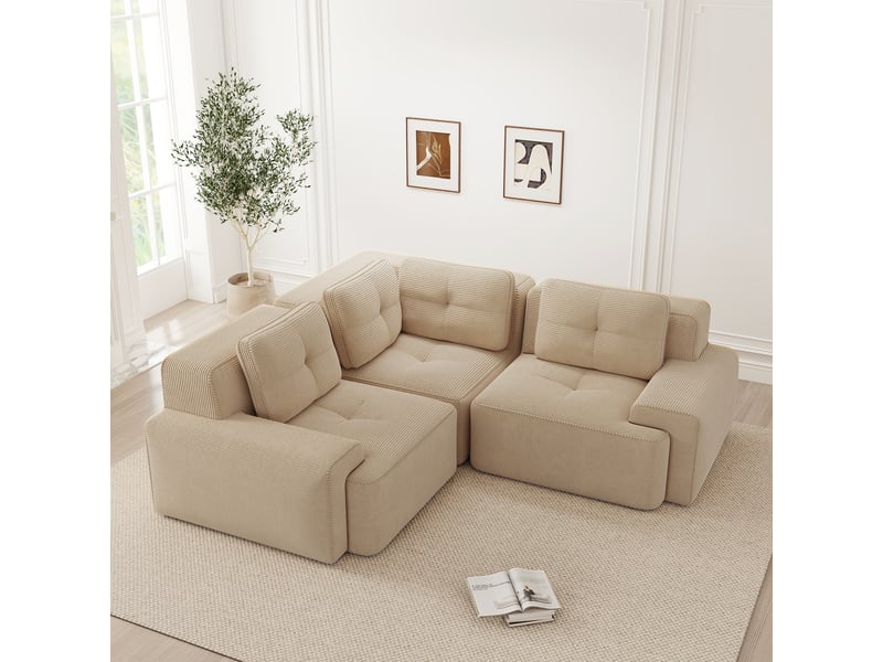 Canapé d'angle modulaire avec assise profonde, confort enveloppant et base antidérapante, en tissu côtelé beige - Conforama D