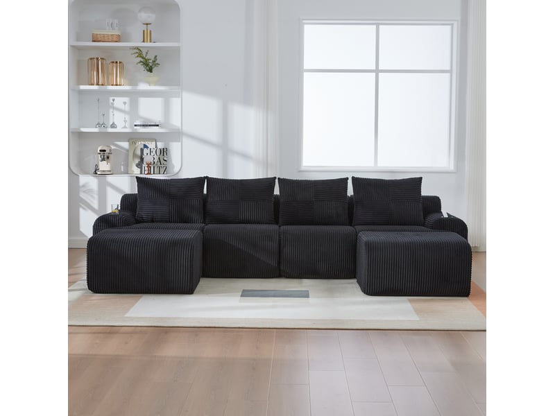  Canapé modulable 4 places 333x174x80 cm, velours côtelé noir, porte-gobelet incorporé, poche latérale, assise large  - Conforama D