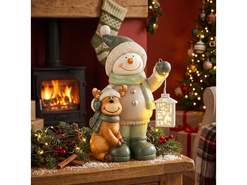 Bonhomme de neige en métal de 43 cm avec lanterne led et minuterie, pour entrée et porte. - Conforama C
