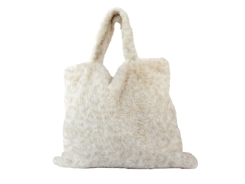  Plaid effet fourrure léopard 300 g,m² en flanelle avec sac de rangement - 125x150cm - ecru  - Conforama C
