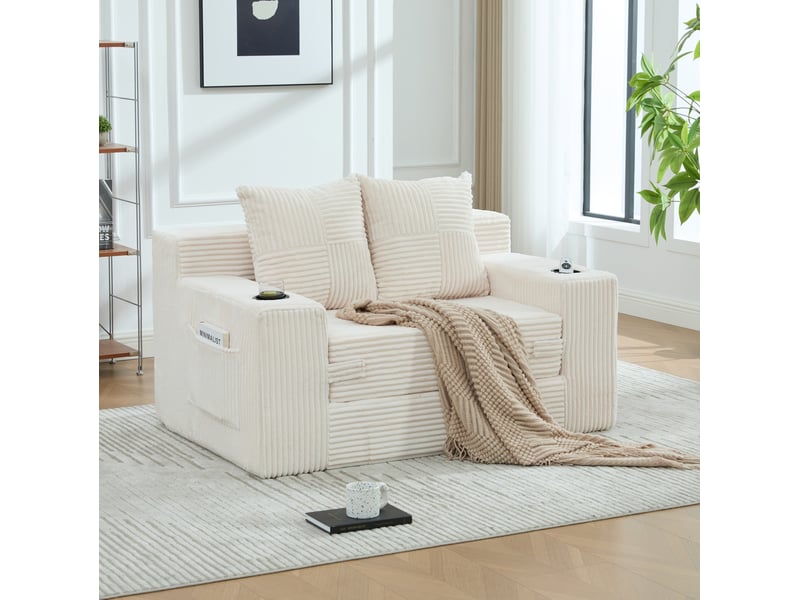  Canapé convertible 2 places 133x87x64 cm beige en velours côtelé, poches latérales et porte-gobelets  - Conforama B