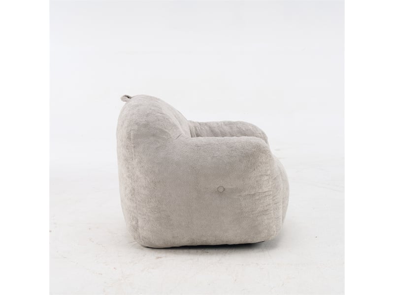  Pouf fauteuil gris clair en fausse fourrure avec accoudoirs, rembourré mousse  - Conforama E