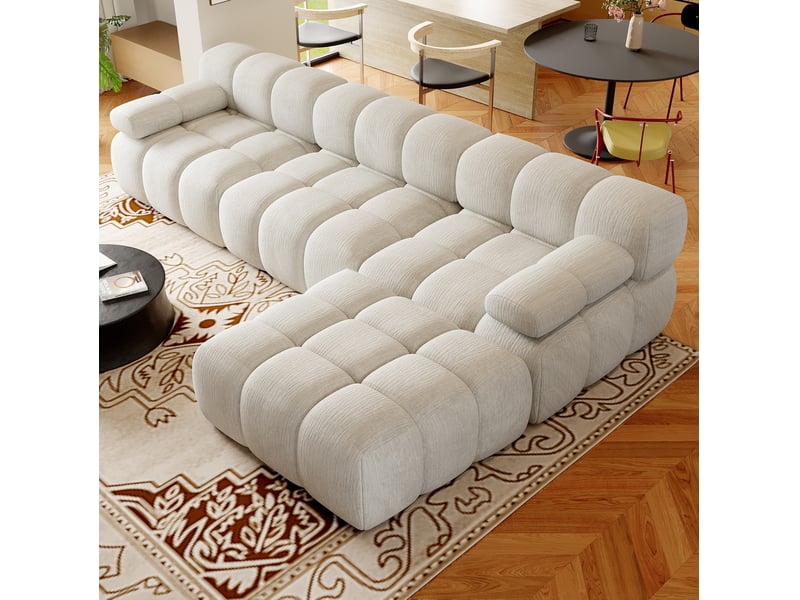 Canapé d'angle fixe 4 places en tissu blanc 300 cm, lignes arrondies et mousse confortable pour le salon - Conforama E