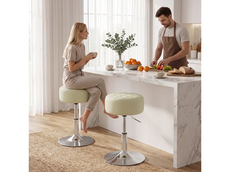  Tabouret de bar en similicuir blanc, hauteur réglable, pivotant à 360° et assise moelleuse.  - Conforama C