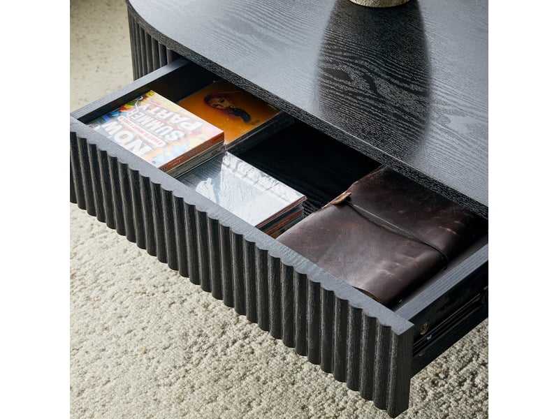  Table basse ovale avec 1 tiroir et espace ouvert, finition effet bois noir nervuré, en mdf, 118 × 65 × 17 cm  - Conforama E