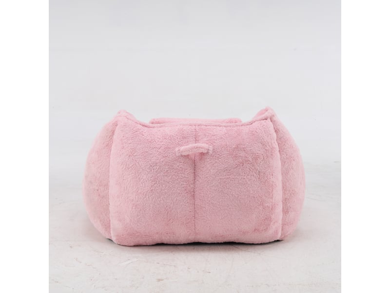 Pouf géant rose en fausse fourrure avec coussin, assise confortable pour salon - Conforama D