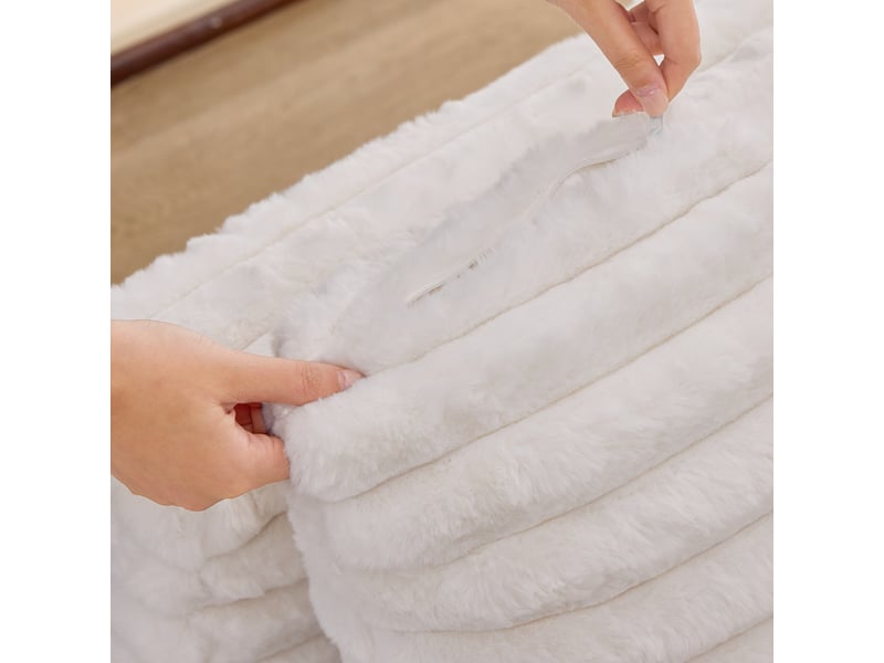  Canapé 2 places en fausse fourrure blanche avec porte-gobelets et tiroir intégré sous l'assise  - Conforama E