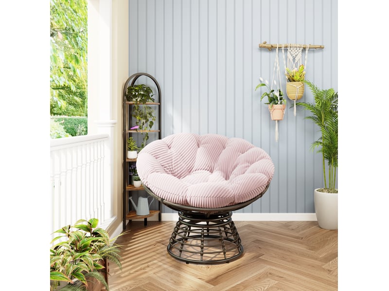  Fauteuil papasan pivotant 360° en résine tressée marron avec coussin rose épais, idéal pour lecture et détente  - Conforama E