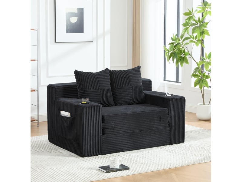  Canapé convertible 2 places avec deux coussins, porte-gobelet et poches latérales en velours côtelé noir  - Conforama B