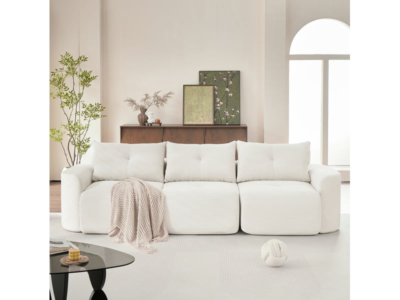  Canapé modulable 3 places couleur beige, configuration 2+1, design arrondi, mousse, revêtement côtelé  - Conforama B