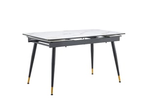 Table de salle à manger extensible en pierre frittée avec plateau effet marbre, structure en métal noir et pieds dorés