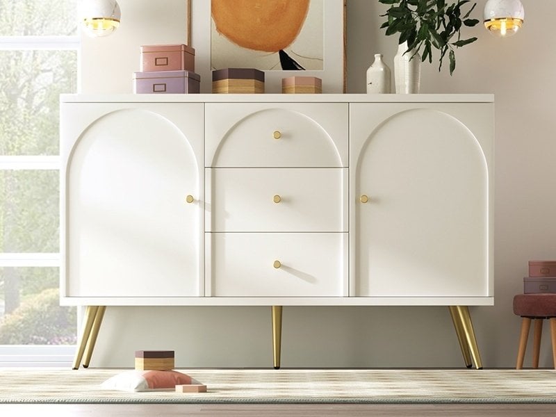  Commode à 3 tiroirs et 2 portes, 140 x 40 x 84 cm, façades arquées et étagères réglables, blanc crème  - Conforama B
