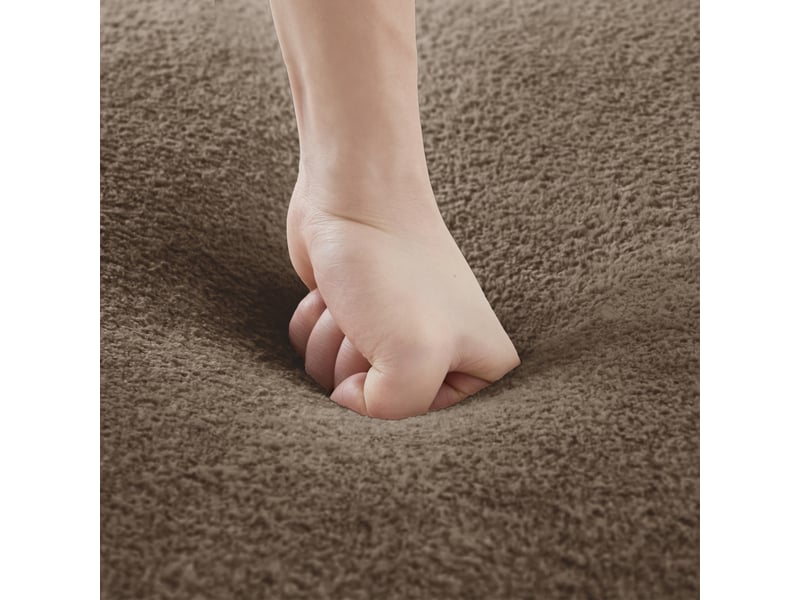 Canapé d'angle modulable 4 places en velours marron avec ottoman, dossier ondulé pour votre salon familial  - Conforama D